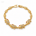 Elephant Bracelet — Gold Tone & White