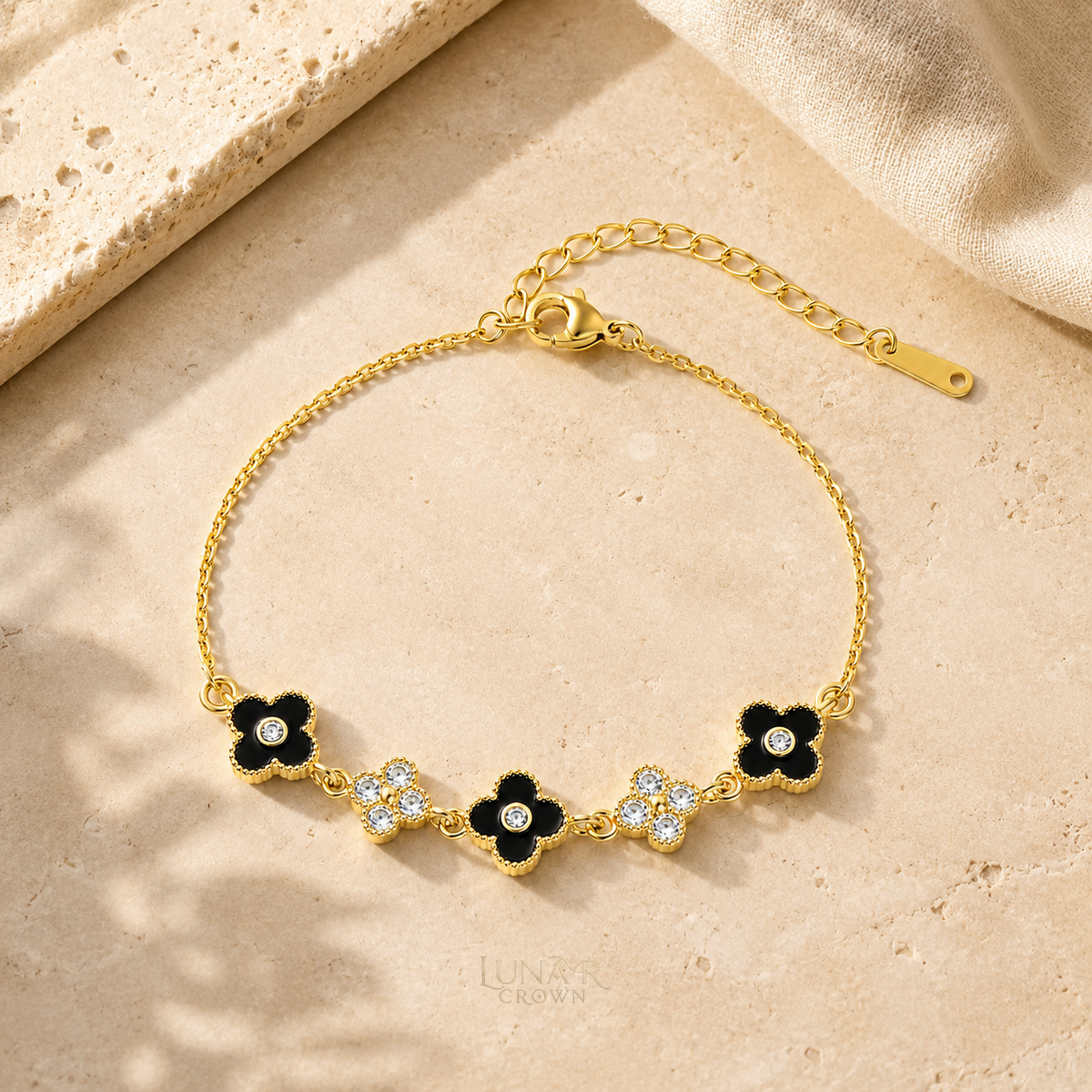 Black Four-Petal Flower Bracelet — Gold Tone
