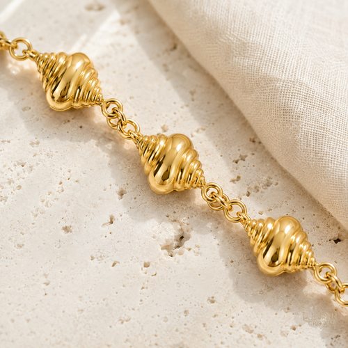 Conch Shell Bracelet — Gold Tone