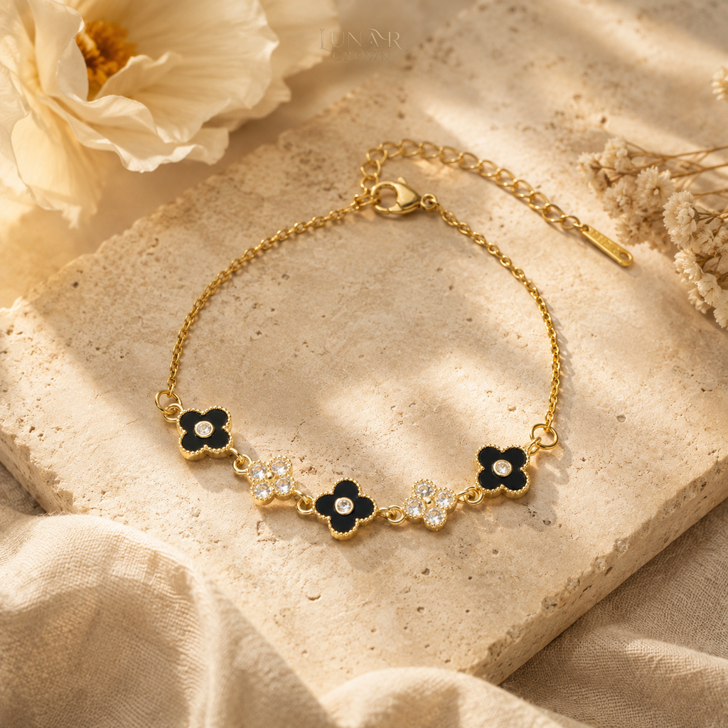 Black Four-Petal Flower Bracelet — Gold Tone