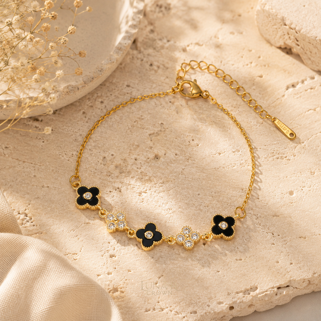 Black Four-Petal Flower Bracelet — Gold Tone