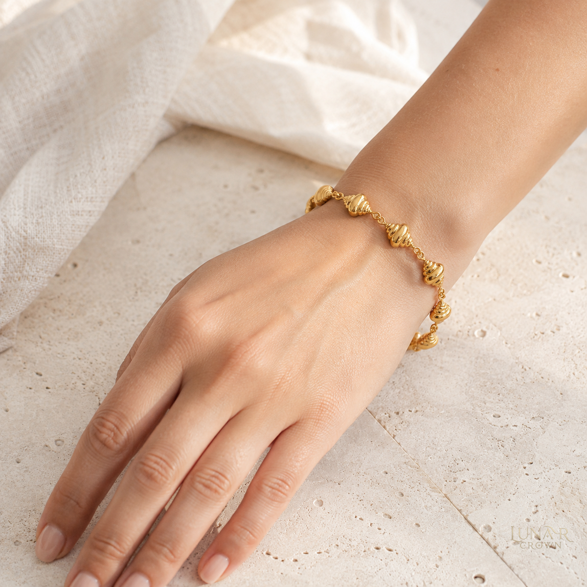 Conch Shell Bracelet — Gold Tone