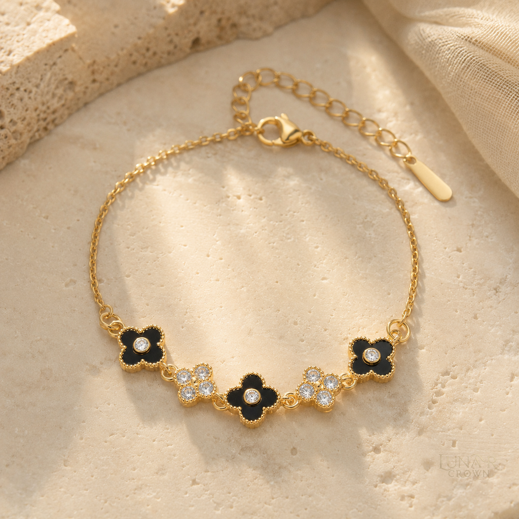 Black Four-Petal Flower Bracelet — Gold Tone