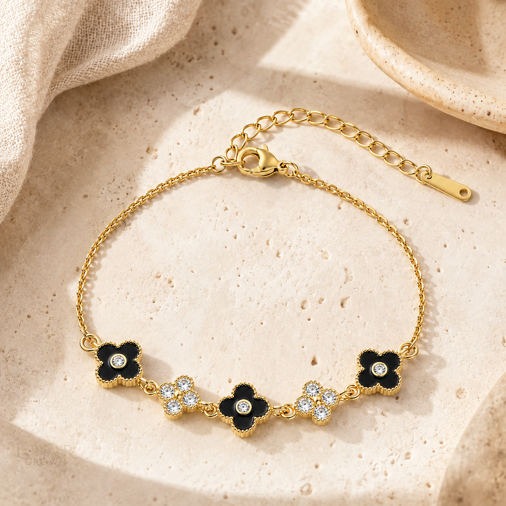 Black Four-Petal Flower Bracelet — Gold Tone