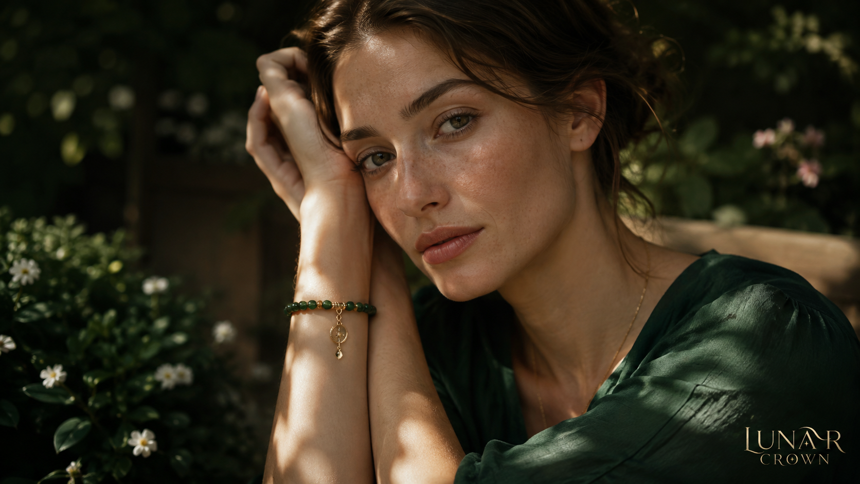 Green bracelet styled in a sunlit garden